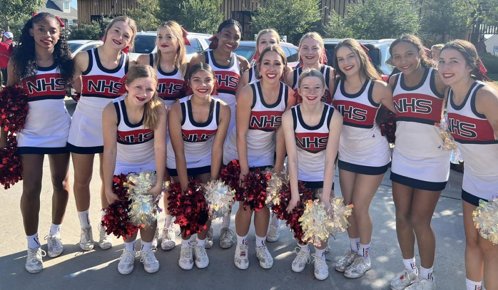 NHS group of cheerleaders smiling